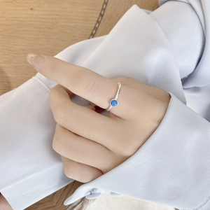 Adjustable S925 sterling silver ring featuring a round blue turquoise and hammered texture