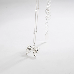Elegant 925 sterling silver bow pendant necklace with beaded chain and extender