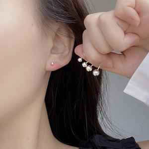 Minimalist S925 sterling silver round ball stud earrings in various sizes on model