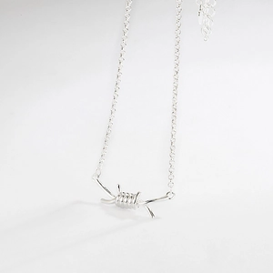 Minimalist S925 sterling silver necklace featuring a unique industrial wire mesh pendant