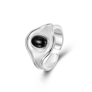 Minimalist 925 sterling silver ring with oval black agate in lava design