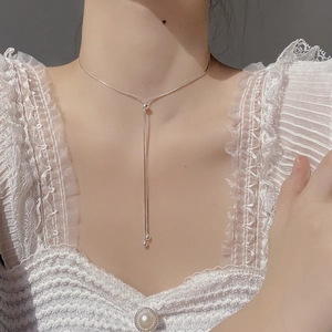 Elegant S925 sterling silver Y-shaped snake chain necklace worn by a female model