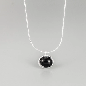 Minimalist S925 sterling silver necklace featuring an oval black onyx pendant and snake chain