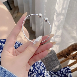 Minimalist 925 sterling silver open bangle featuring double polished metal beads