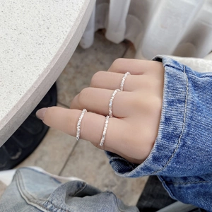 Handmade 925 sterling silver crushed silver rings with irregular texture and elastic cord