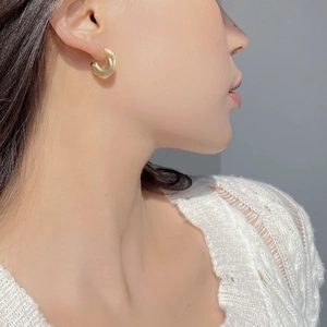 Minimalist S925 sterling silver C-shaped gold stud earrings with a matte brushed finish