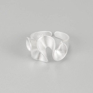 Detailed view of matte S925 sterling silver wavy ring with S925 hallmark stamp