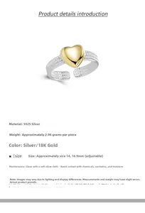 Detail of S925 sterling silver twist ring featuring a polished 18K gold heart accent