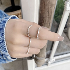 Close-up of S925 sterling silver multi-layer linked rings with hammered texture