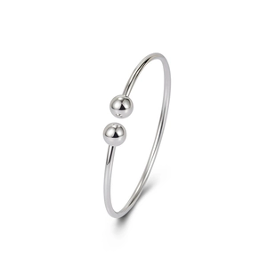 Minimalist 925 sterling silver open bangle with dual polished spherical ends on white backdrop