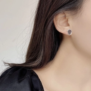 Elegant 925 sterling silver geometric hexagonal earrings with grey shell inlay on model