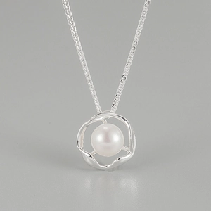 Macro shot of S925 sterling silver necklace with a natural freshwater pearl pendant