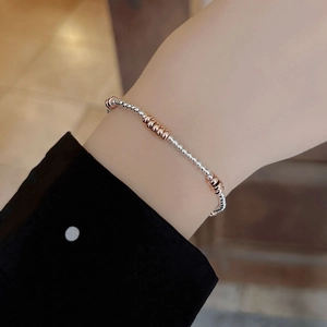 925 sterling silver minimalist beaded bracelet featuring contrasting rose gold accents