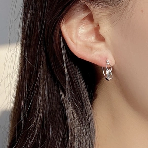 Minimalist S925 sterling silver double-layered geometric hoop earrings on female model