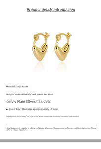 Detail view of 13.5mm heart-shaped S925 silver hoop earrings with 18k gold finish