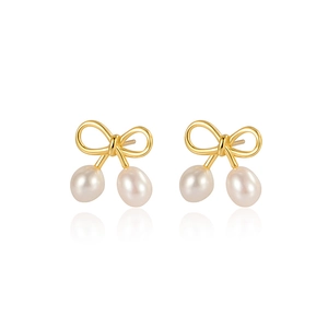Boucles d'oreilles nœud élégantes avec perles d'eau douce baroques et finition dorée