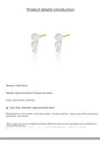 Detail of three graduated white pearls on S925 silver stud with 18k gold plating