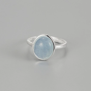 Elegant S925 sterling silver ring with oval ice blue aquamarine gemstone on grey background