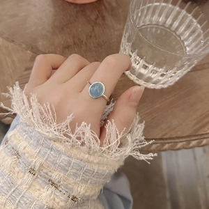 Minimalist S925 sterling silver open ring featuring an oval blue aquamarine gemstone