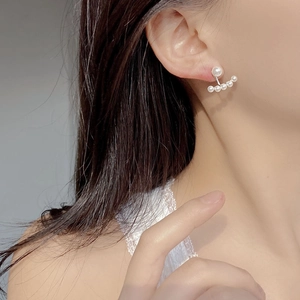 Elegant 925 silver pearl stud earrings with a curved back-hanging five-pearl design