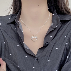 S925 sterling silver heart-shaped angel wings pendant necklace worn on neck
