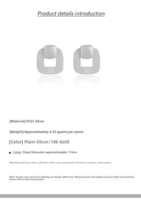 Close-up of geometric S925 sterling silver square earrings with matte textured finish