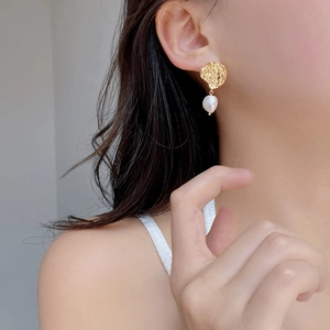 Lava ripple gold earrings with baroque pearl drops for women in retro designer style