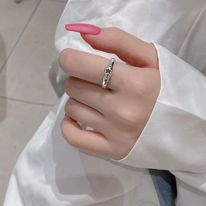 S925 sterling silver ring with green star zircon and colorful accents on finger