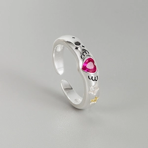 925 silver open ring featuring a red heart gemstone and star accents in a minimalist style