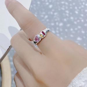 Detail of S925 silver ring featuring colorful zircon stones and irregular wavy design