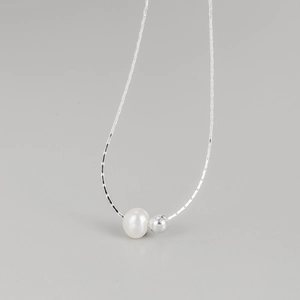 Minimalist S925 sterling silver necklace with a white pearl and silver bead pendant