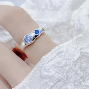 Close-up of S925 silver irregular wave ring with colorful heart and square zircon stones