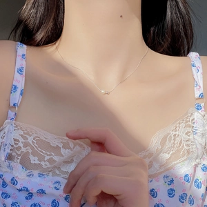S925 sterling silver snake chain necklace with pearl pendant on model neck