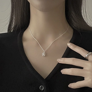 Irregular natural freshwater pearl necklace with minimalist S925 silver ring on model