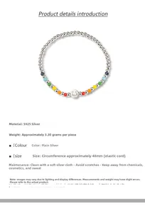 Detail of S925 sterling silver beaded bracelet with colorful charms and smiley face