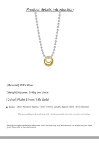 Close-up of S925 sterling silver ball chain with 18k gold pendant and size details