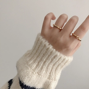 Minimalist S925 sterling silver wave rings in gold finish with knot detail and sleek band