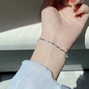 Minimalist 925 sterling silver cube chain bracelet for women on a model wrist