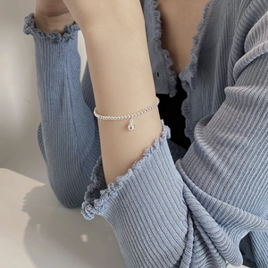 Minimalist 925 sterling silver beaded bracelet with a polished mirror ball pendant for women
