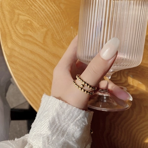 Minimalist double layer gold bead ring featuring a polished mirror finish for women