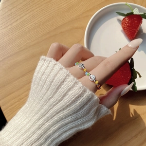 Colorful beaded elastic ring with silver smile face charms on 925 silver band