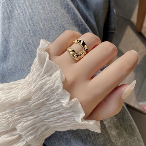 Adjustable S925 sterling silver ring with gold pleated texture and open U-shape design