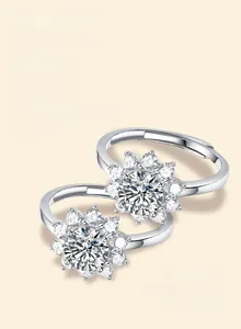Detailed view of adjustable silver sunflower ring featuring a large Moissanite center stone