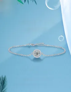 Macro detail of S925 sterling silver moissanite bracelet with halo round pendant