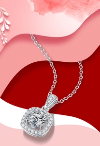 Macro shot of silver square moissanite pendant with halo setting on thin cable chain