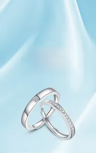 Detailed view of adjustable 925 silver couple rings with square and pavé diamonds