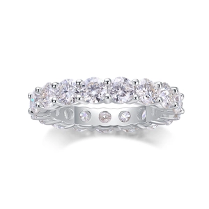 Elegant 925 sterling silver eternity ring featuring round moissanite in prong setting