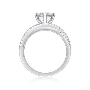 Exquisite S925 silver moissanite ring with four-prong setting and side diamond accents