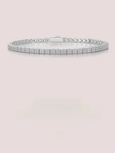 Macro detail of S925 sterling silver tennis bracelet with square-set moissanite stones