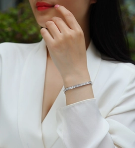 Close-up of S925 sterling silver tennis bracelet with square-cut moissanite stones